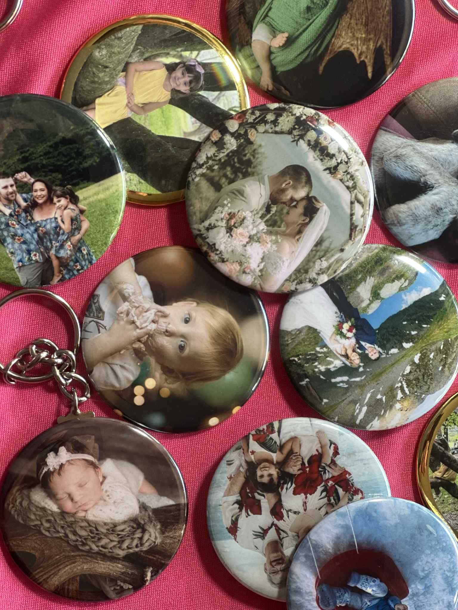 Various pins displayed on a red cloth surface. Various pins displayed on a red cloth surface.