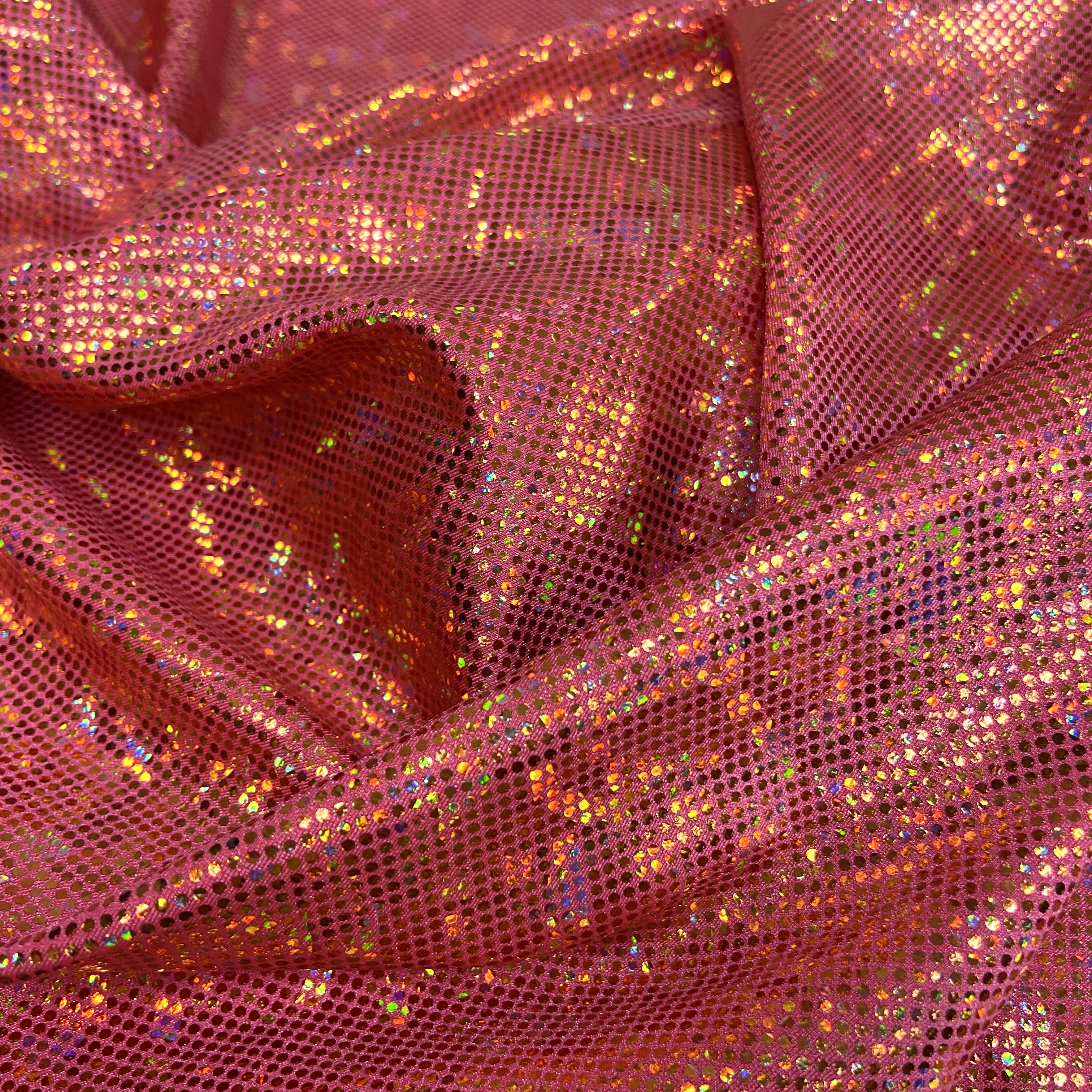 Gold shattered hologram on salmon