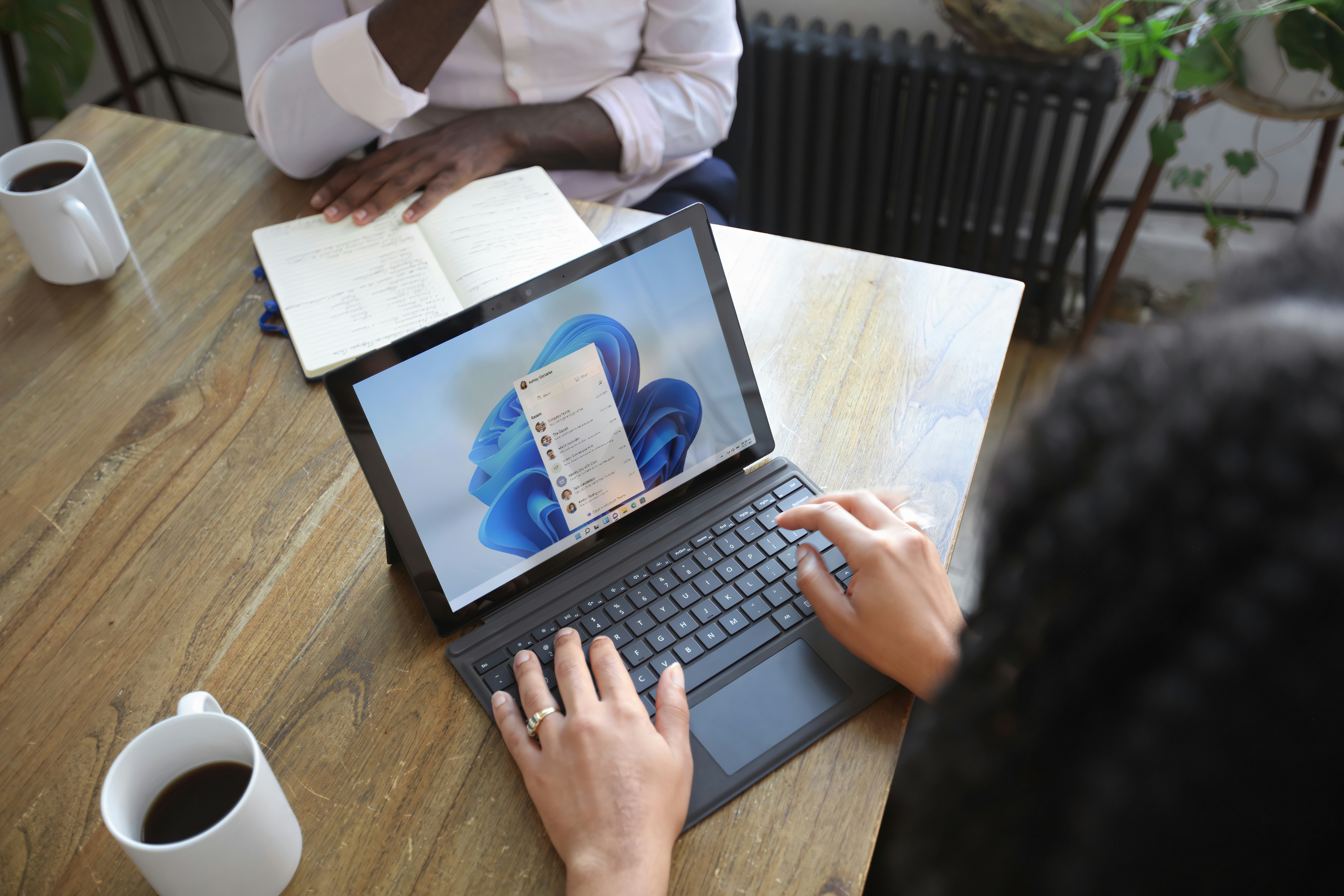 Laptop with Microsoft logo as the screensaver