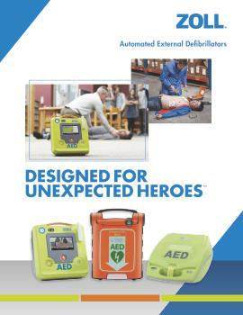 Portable AED defibrillator in a red case on a city sidewalk with palm trees and buildings in the background.