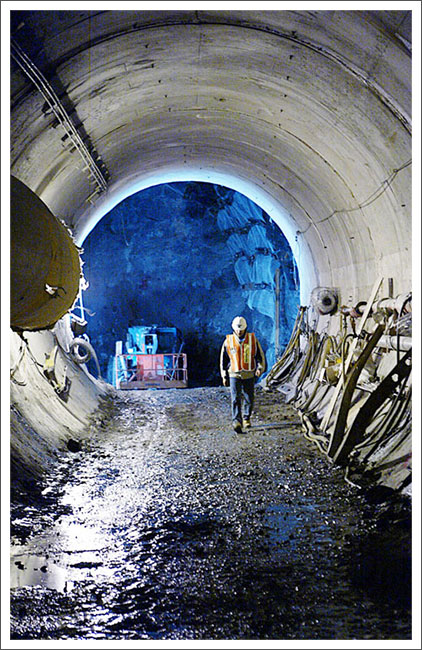 Worker in tunnel||||