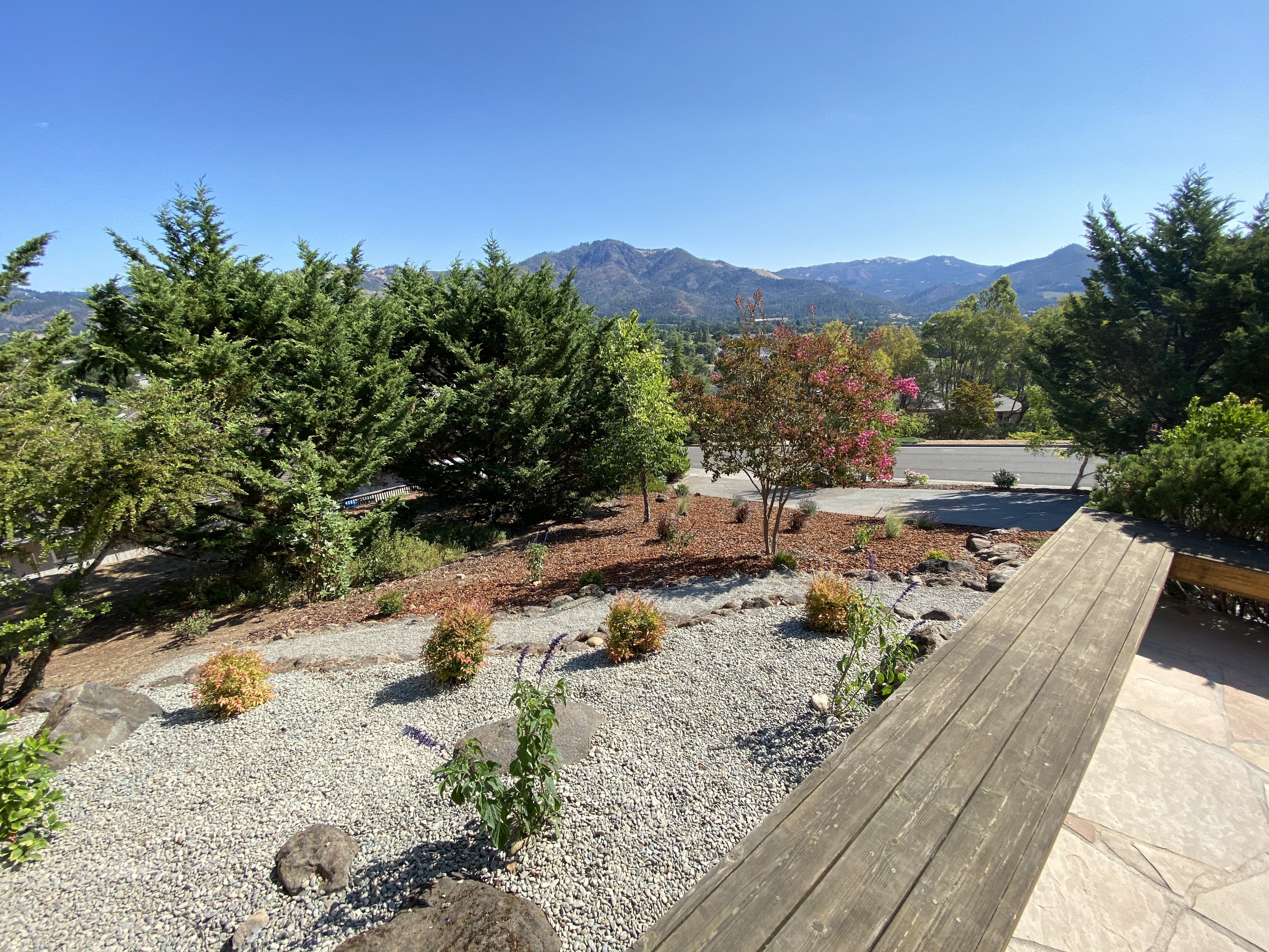 After - Firesafe gravel 6' near house and colorful blooms to grow in.
