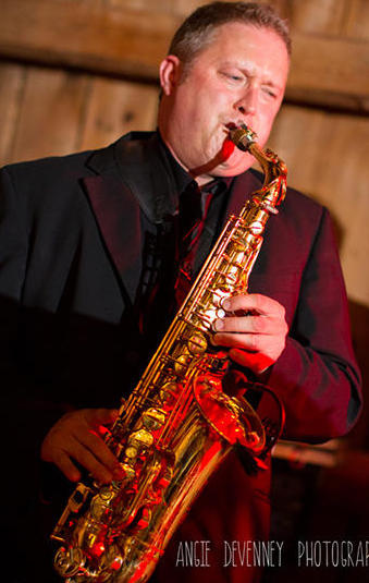Darren Whitney on sax, the icing on the cake (photo by A. Devenney)