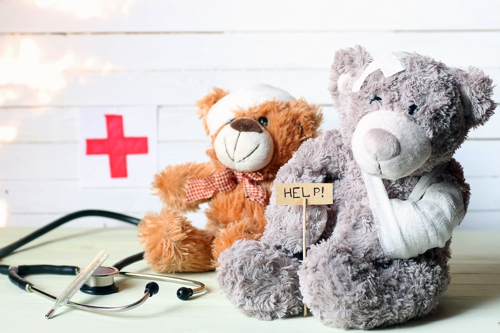 Injured teddy bears with stethoscope