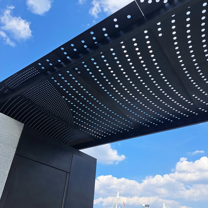 Thames Tideway Victoria Artistic Metals bronze finish on cladding