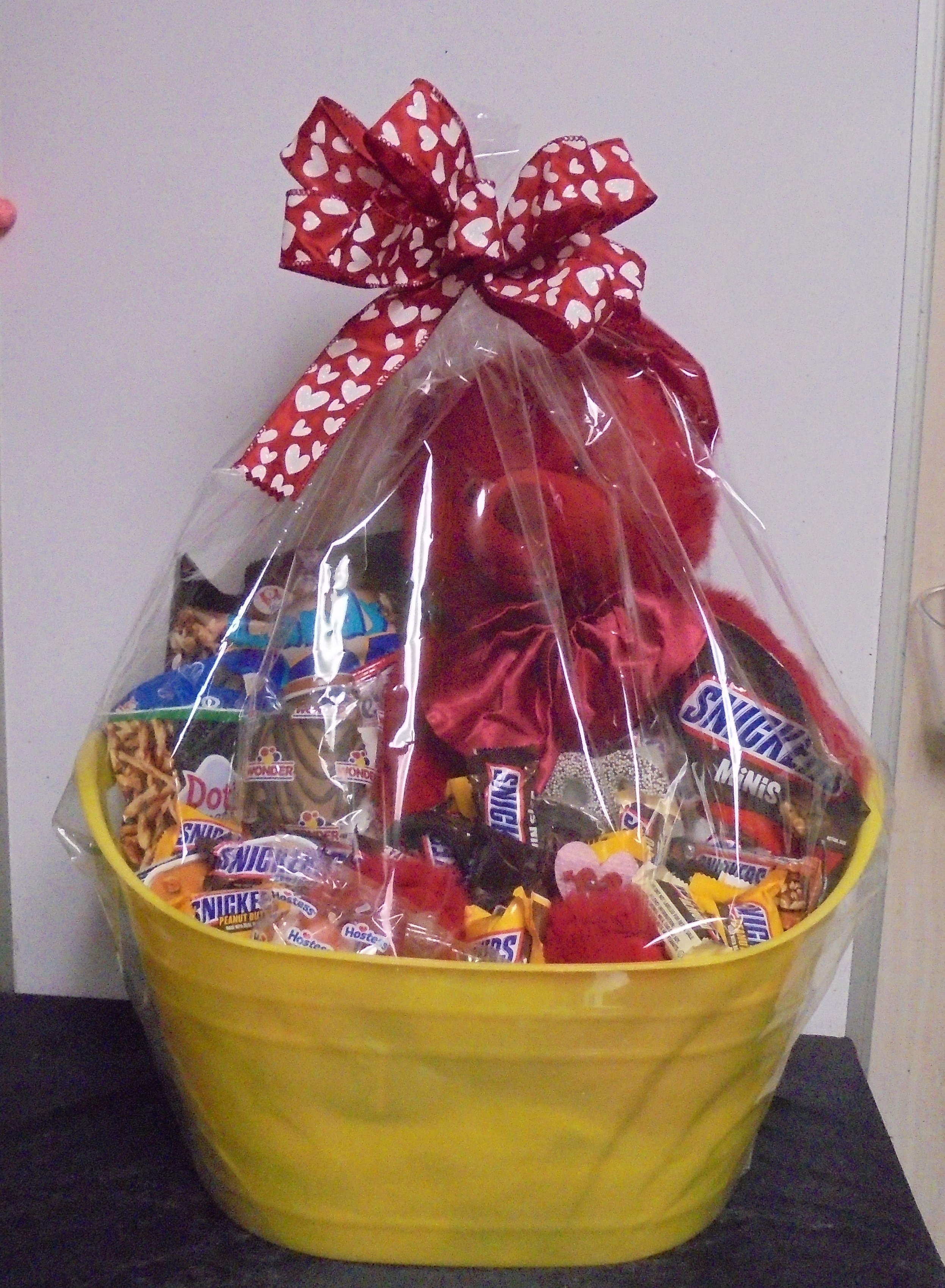 (14) "JUMBO" Snickers Goodie Basket
W/ Plush Bear
$125.00