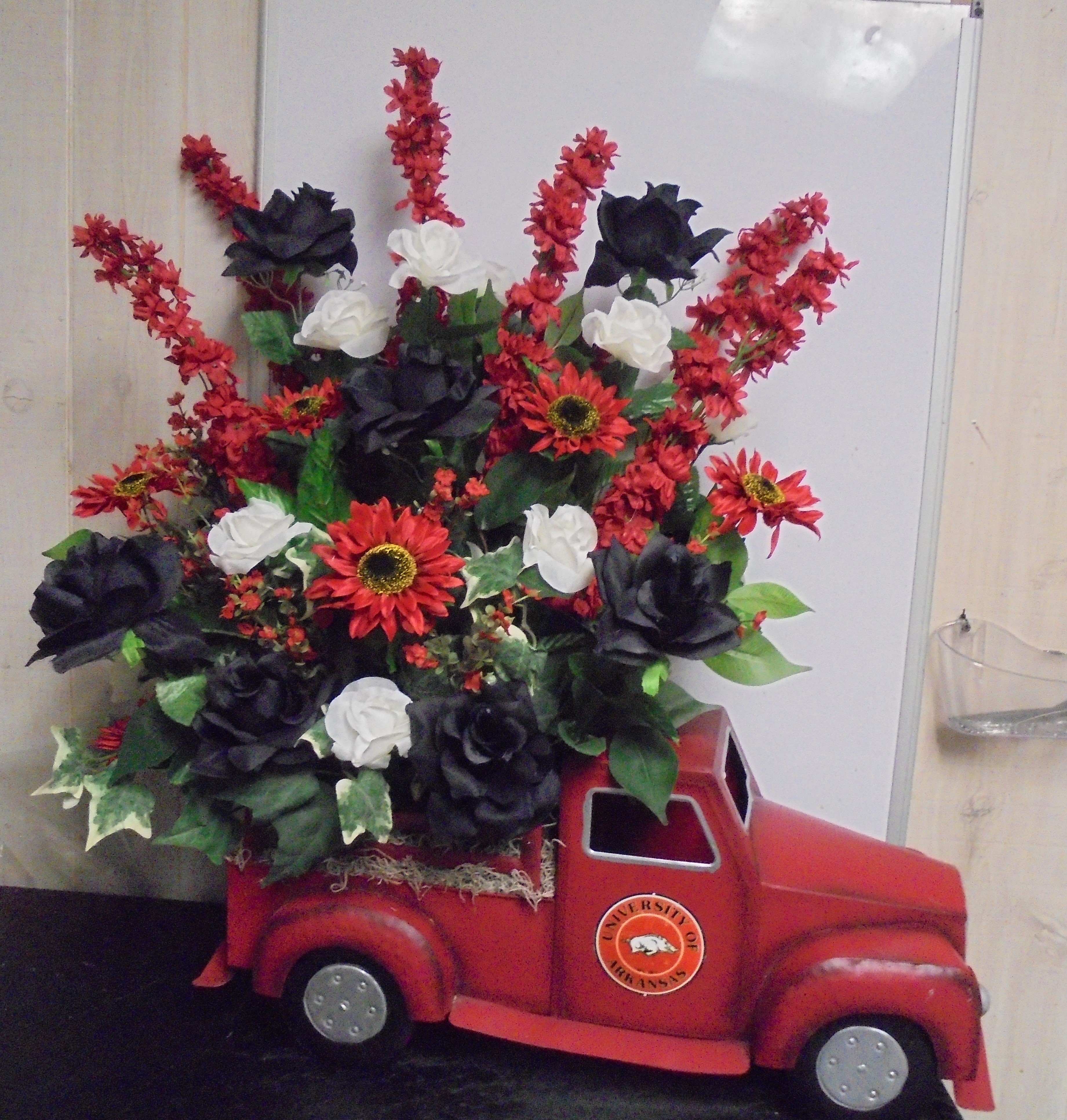 (56)  "Razorback" Metal Truck
W/ Silk Flowers
$150.00