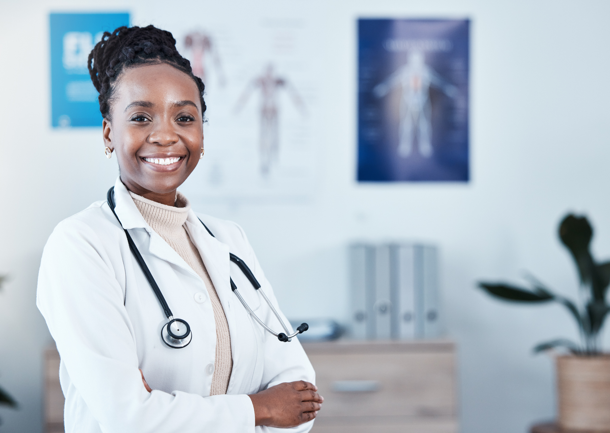 Happy, portrait and black woman doctor