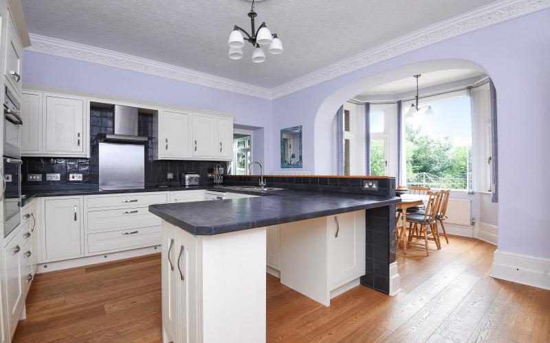 New Kitchen with floor installed and room decorated.