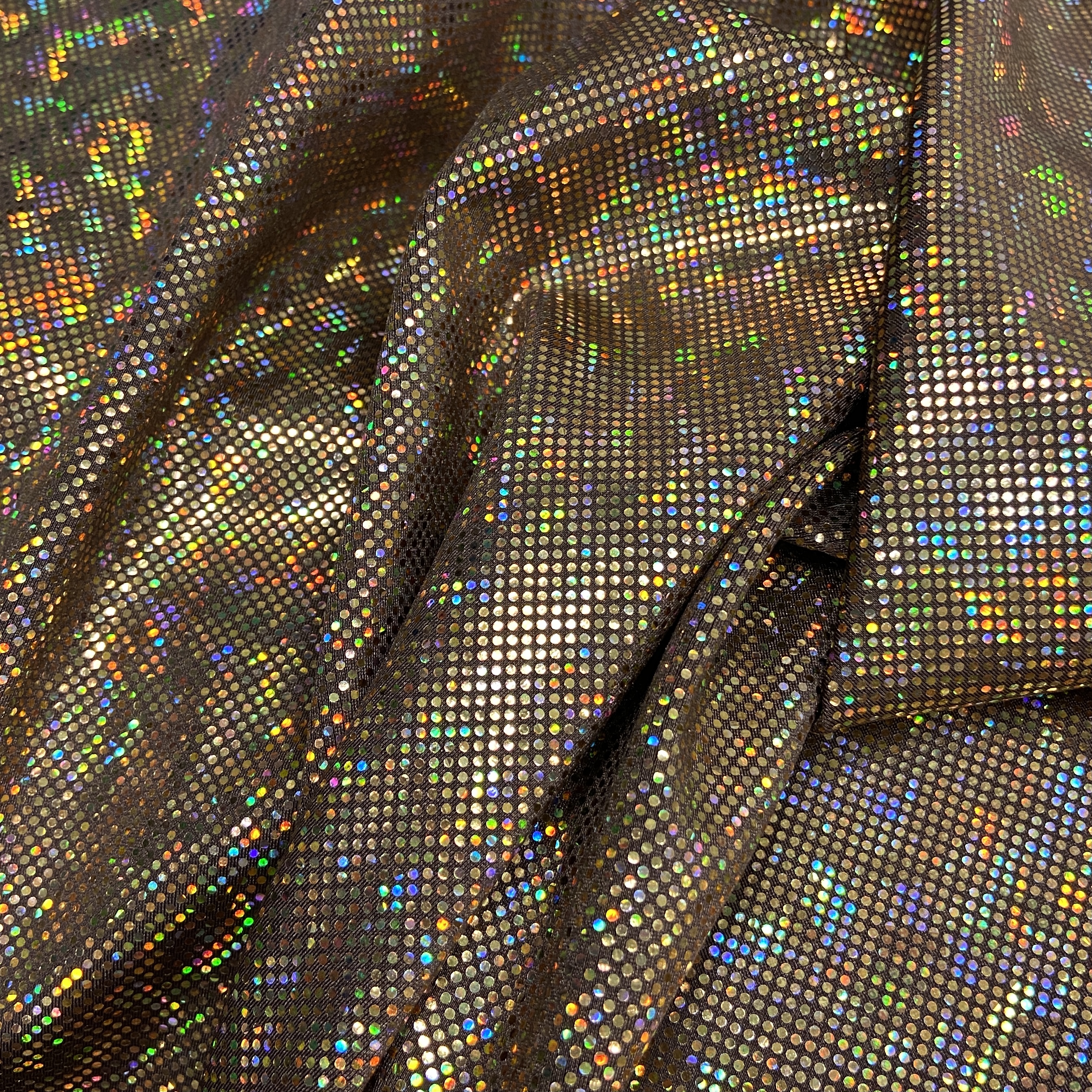 Gold shattered hologram on brown