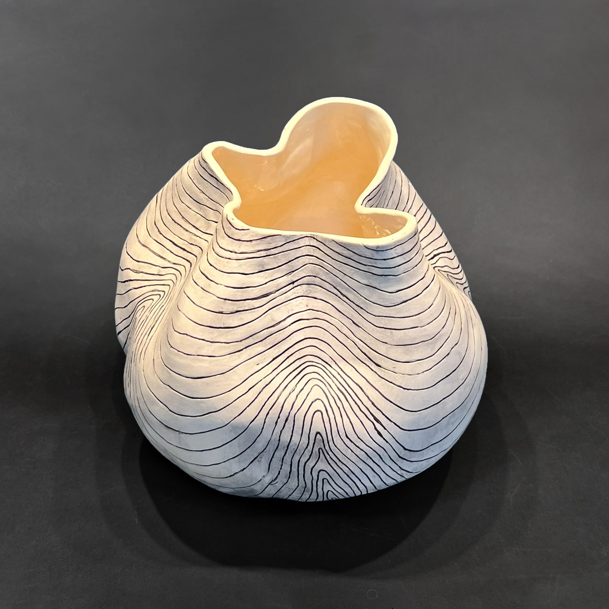 Topographic
Incised porcelain
7"h x 9' w x 9" d
