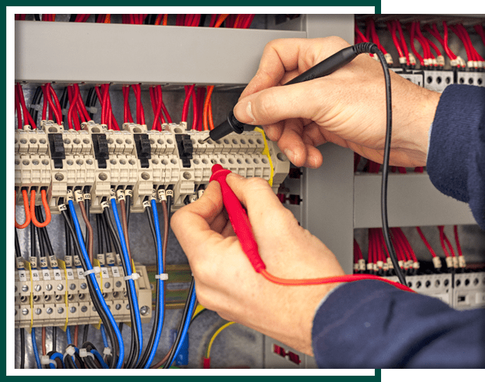Electrician Testing Industrial Panel