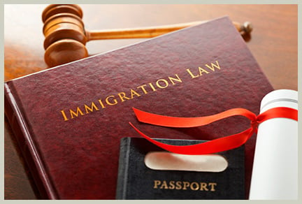Gavel and immigration law book||||
