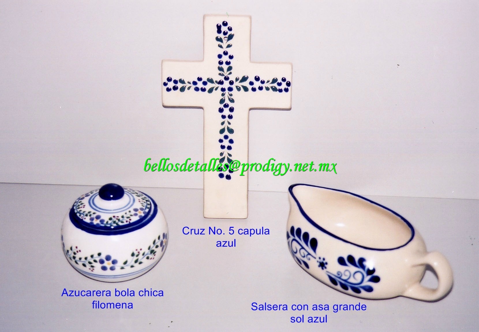 https://0201.nccdn.net/4_2/000/000/019/c2c/Azucarera-bola-chica-filomena--cruz-No.-5-capula-azul-y-salsera-con-asa-grande-sol-azul-1660x1151.jpg