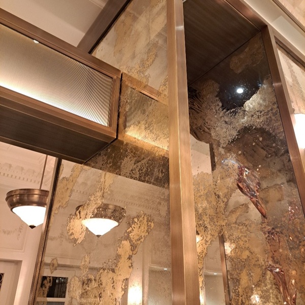 Patinated light aged brass finish to bar surround metalwork. 