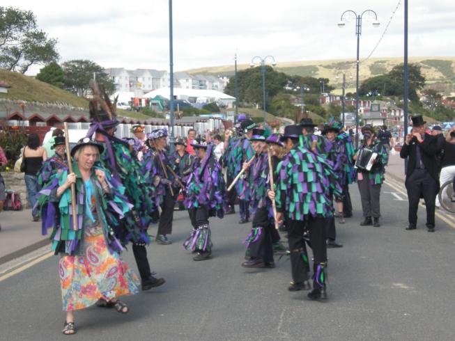 Wicket Brood Border Morris side on the sea front
