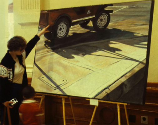Painting of a man showing his art