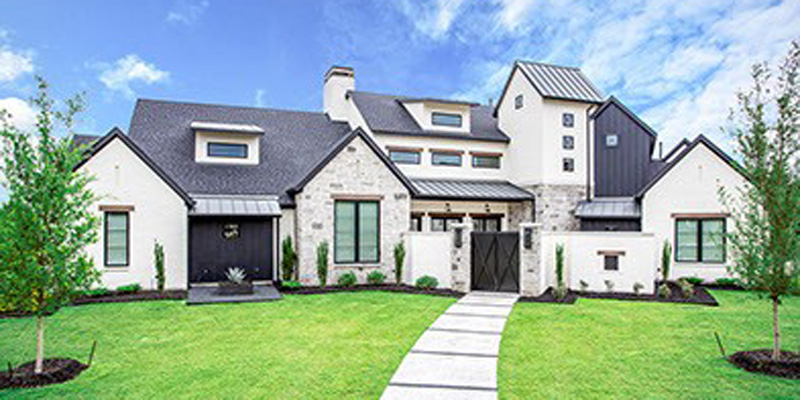 A large home on green grass