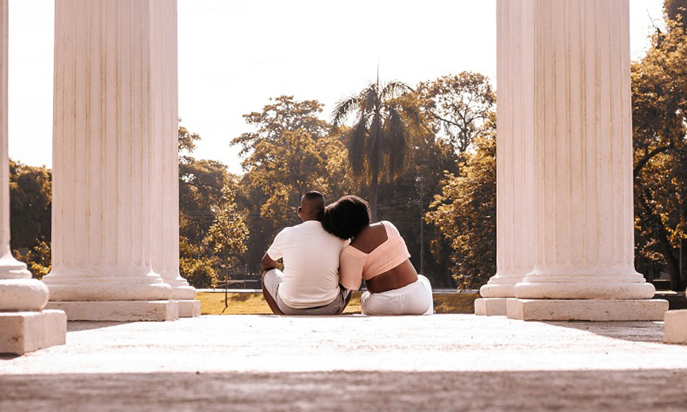 Man and woman sitting together