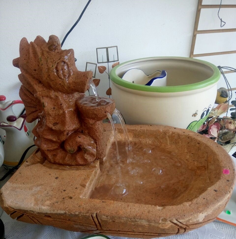 Fuente en cantera, caballito de mar