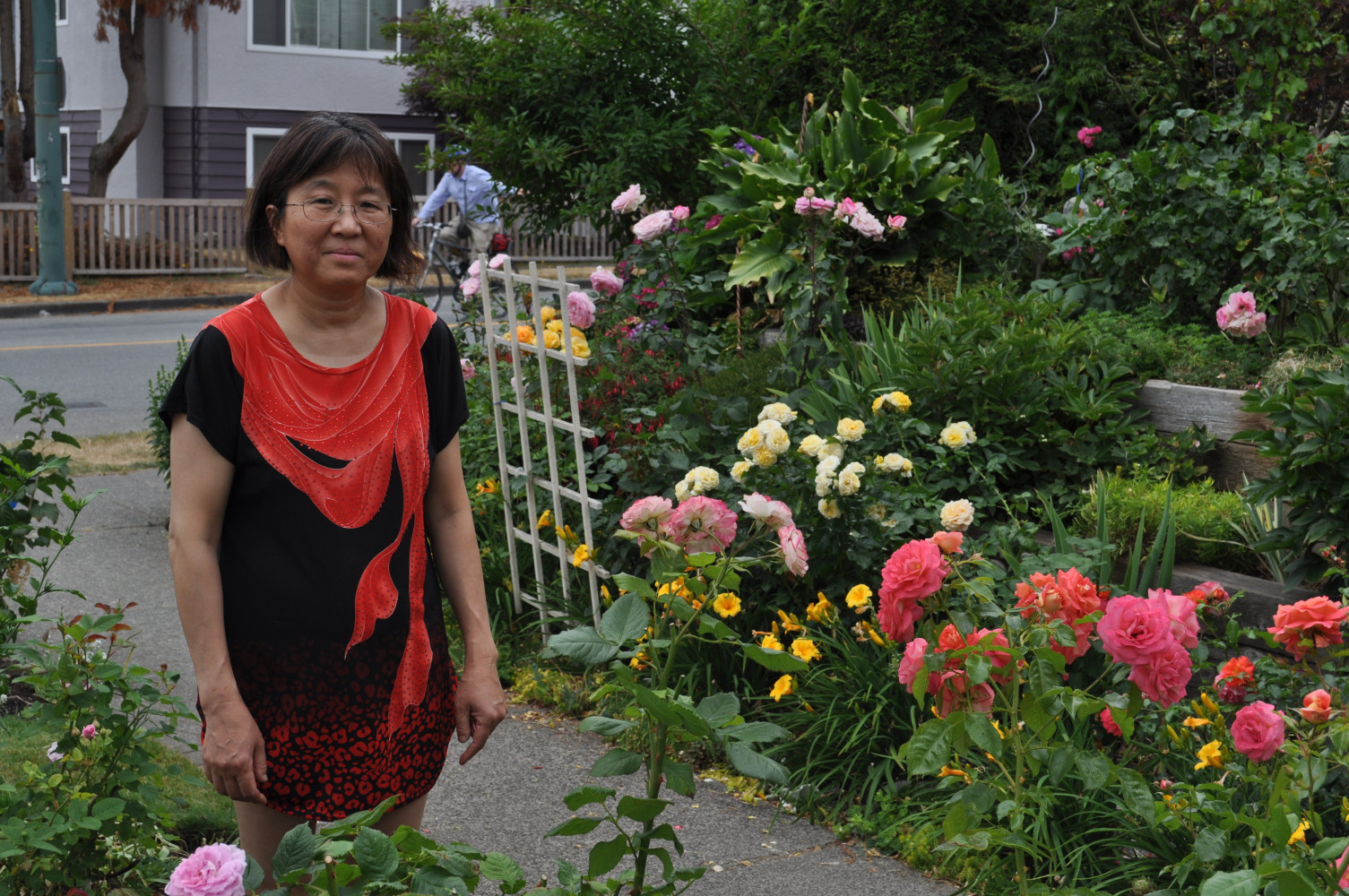 Lilian in her exuberant front garden in South Vancouver.
