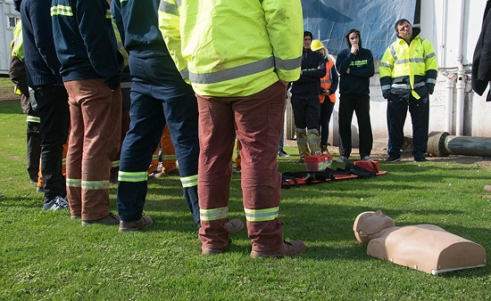 An outdoor first aid or emergency response training session An outdoor first aid or emergency response training session