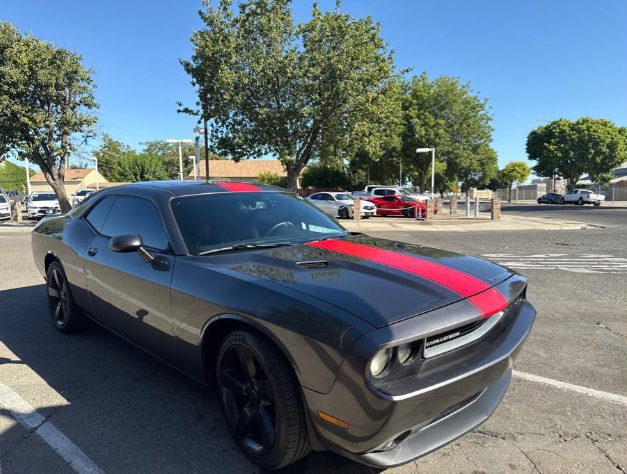 2014 Dodge Challenger from 33 Auto Sales (asncars.com)
Miles: 94,931
Drive: RWD
Trans: Automatic, 5-Spd
Engine: V6, Flex Fuel, 3.6 Liter
Stock: 1582
VIN: 2C3CDYAG5EH176593