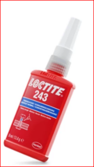 Sala moderna con planta en maceta blanca, sillón gris y marco vacío, iluminada por luz natural.