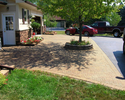 Brick Driveways are a simple way to liven up the front of any home