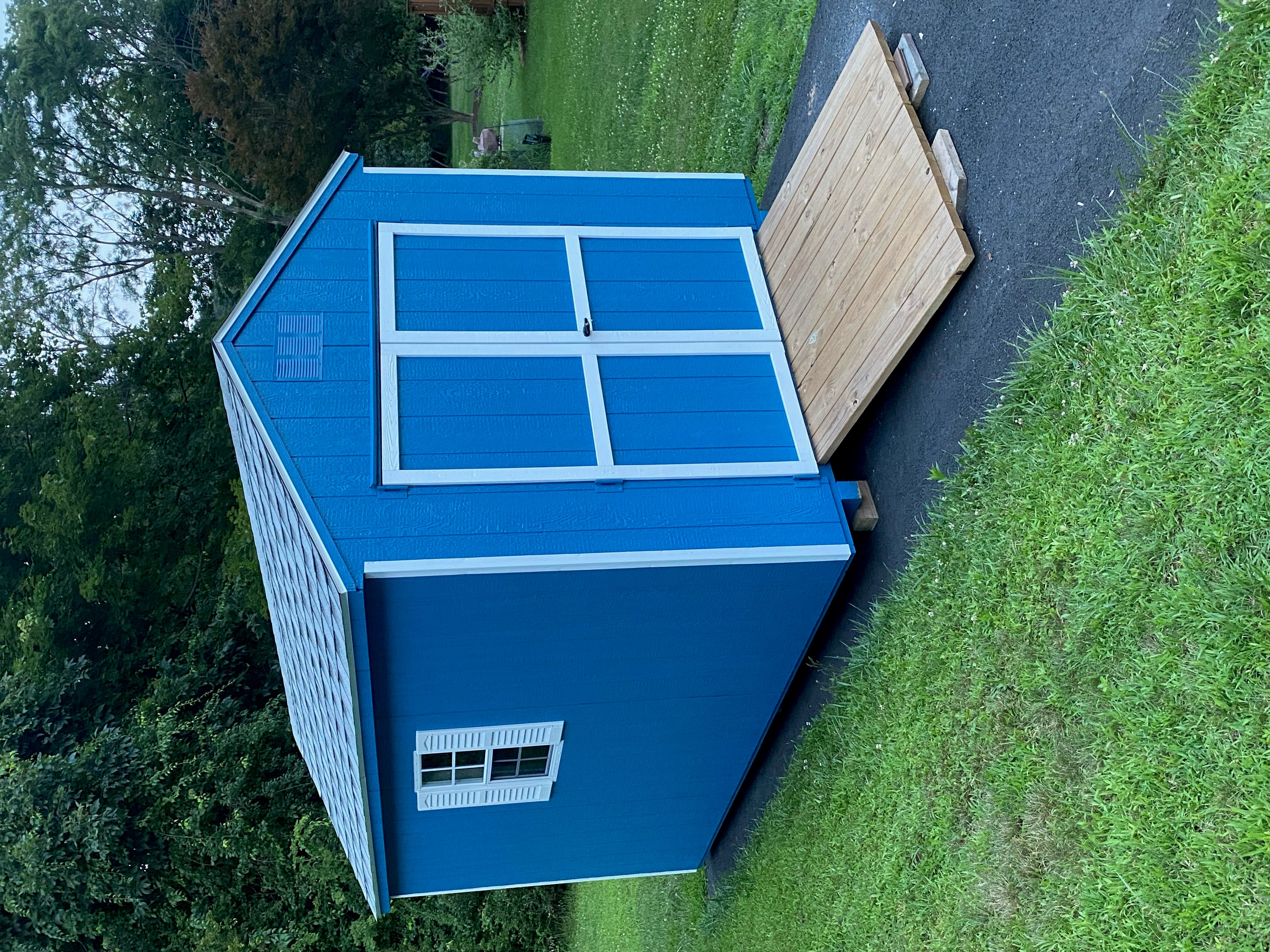 Lets talk about standing out as this 8  x 12 Budget A-Frame is featuring: Georgian Bay Blue T-111 siding, with white trim, and gray 30 year architectural shingles with tarpaper underlayment. Also, featuring: gable vents, 5' double doors, 2-18" x 27" slider window with a screen, 
 white louvered shutters, pressure treated floor joists, and 1- 5 x 4 ramp.

Thank you Ryan! Keep on standing out!