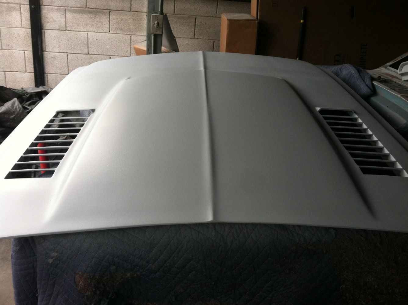 Cut vents out on hood and prep