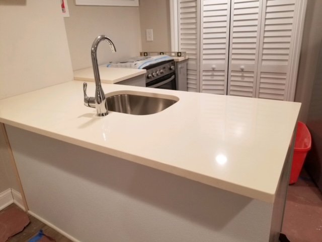 So with offering our fire collection of cabinetry from the basics to a custom color from the Sherman-Williams collection here is our selection of the following counter tops in different photos for your review.