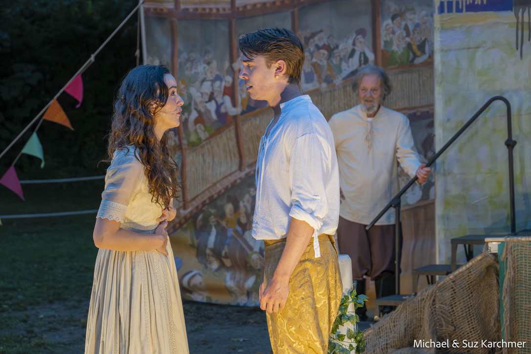 Bernadette Harding as Miranda and James Seufzer as Ferdinand with Bernard Cornwell as Prospero