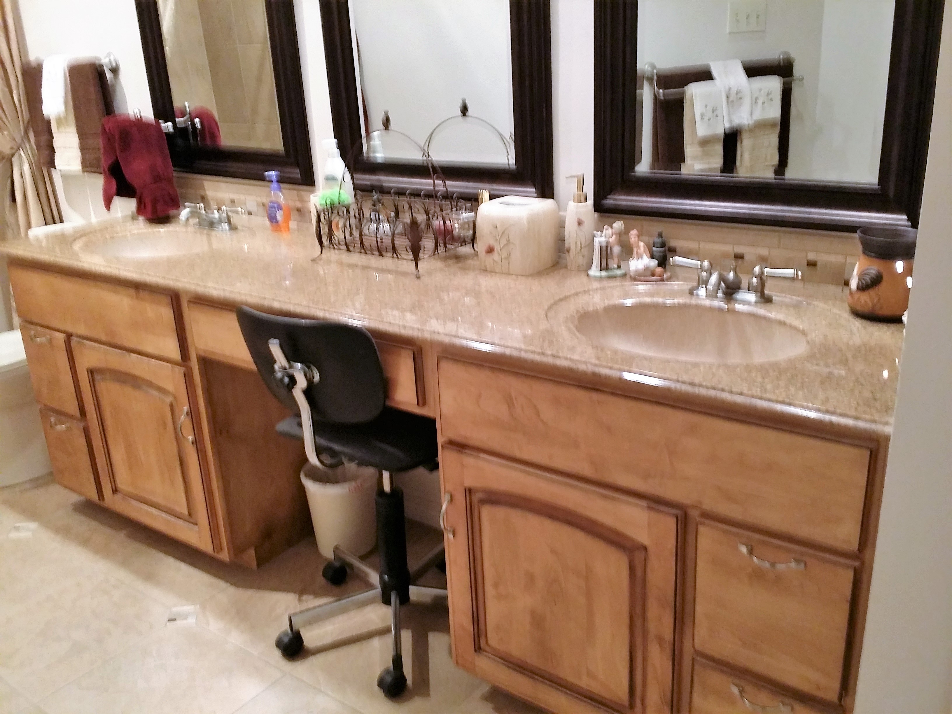  Maple Early American  stained cabinet
 feature five drawers and two arched
 raised paneled doors.