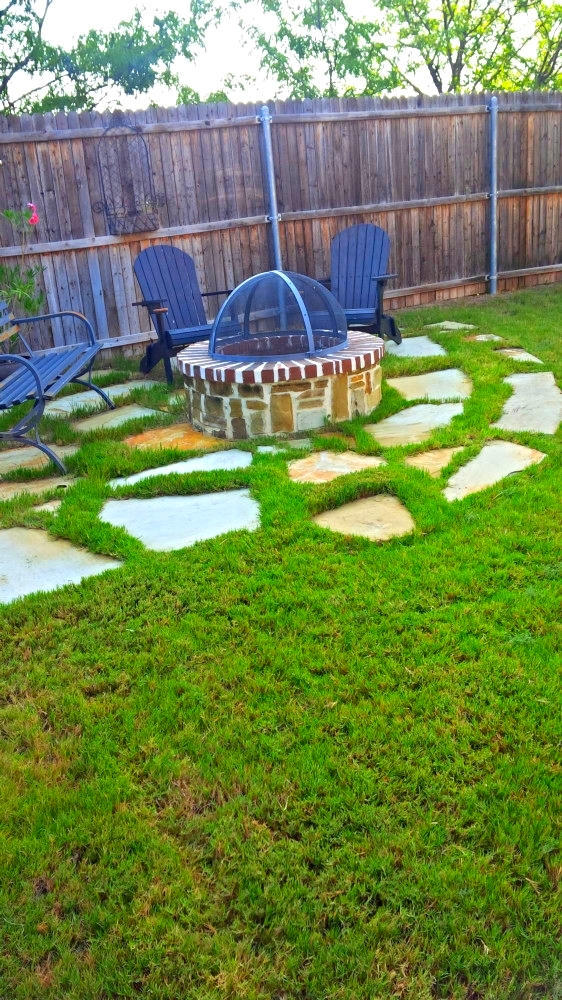 Firepit surrounded by flagstone