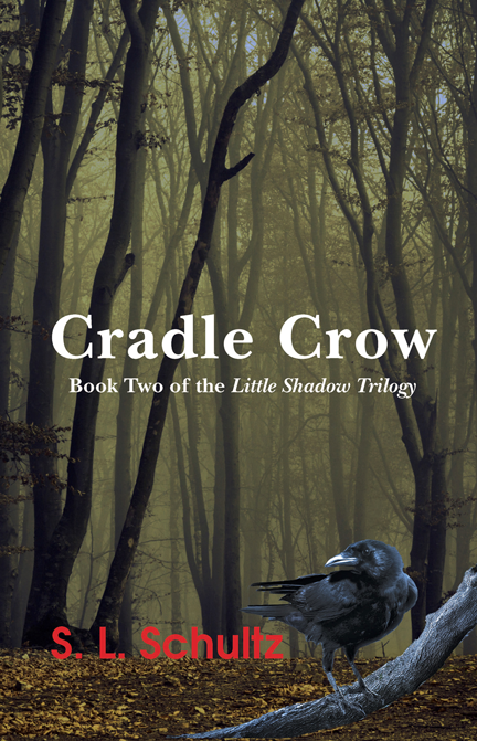 "Cradle Crow" book cover, showing a closeup of a crow in a dark, mist-shrouded forest