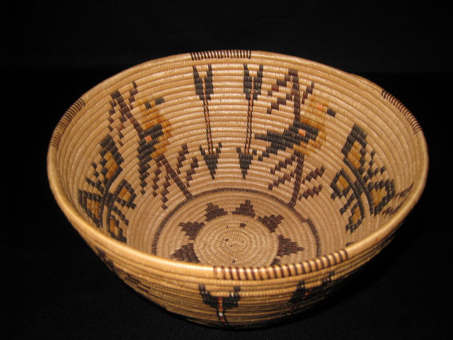 PRODUCT PROFILE :
Product No. : #70010
Description : Panamint Basket
PRODUCT NARRATIVE :
• Mary Wrinkle
• Finely woven with yellow and black Oriole birds
• Size H.6" Diam. 9" circa 1939