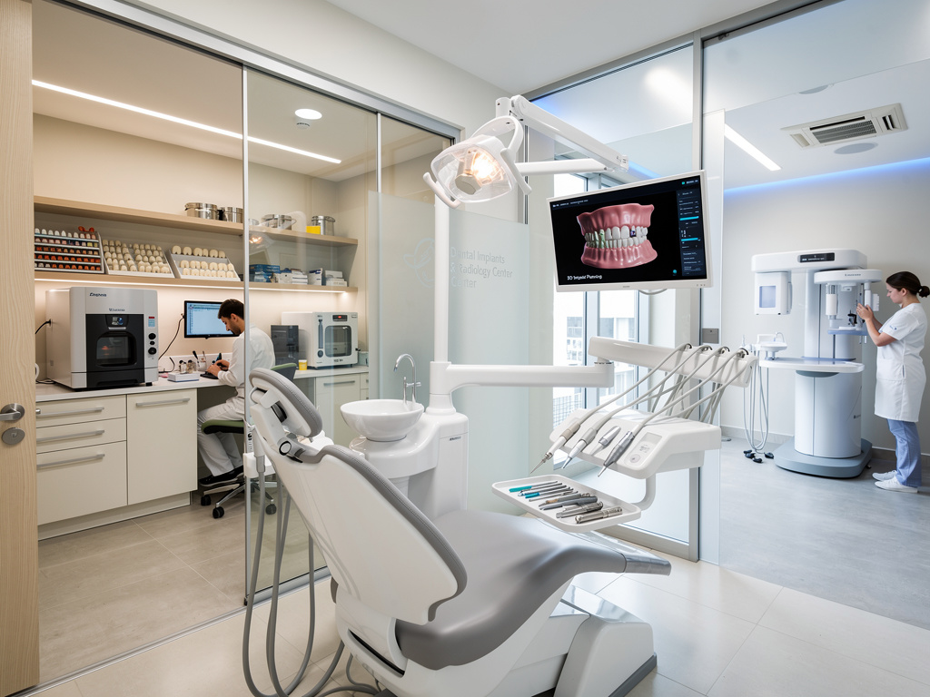 Clínica dental moderna con sillón odontológico, pantalla 3D, laboratorio y equipo de radiografía digital
