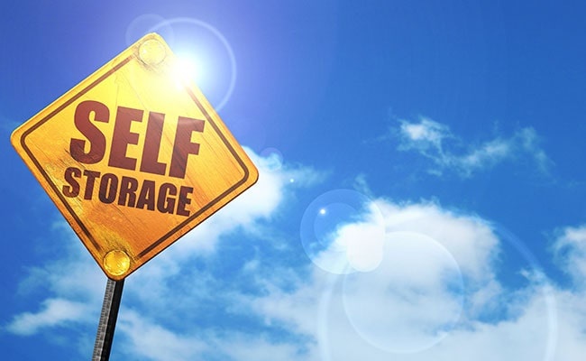 Self Storage, Glowing Yellow Traffic Sign Self Storage, Glowing Yellow Traffic Sign