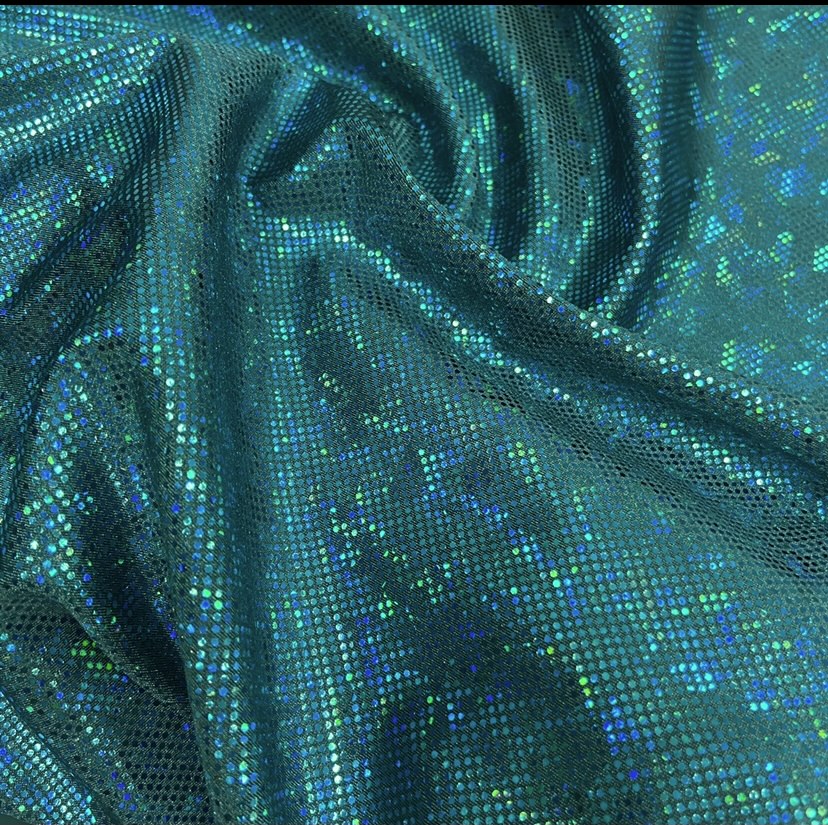 Teal shattered hologram on dark green 