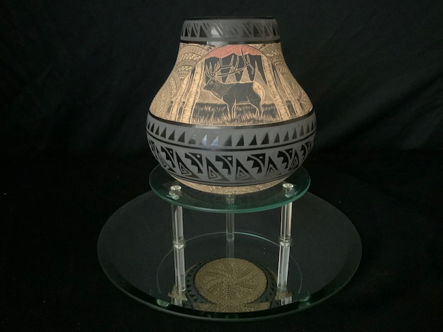 PRODUCT PROFILE :
Product No. : #21257
Description :  Wildlife Bowl
PRODUCT NARRATIVE :
• Artist Marvin Blackmore.
• black & yellow
• Hand etched through clay slips. 
• Design coverage: outside & 
    outside bottom. 
• Size: 5.5" width x 5.5" height. 