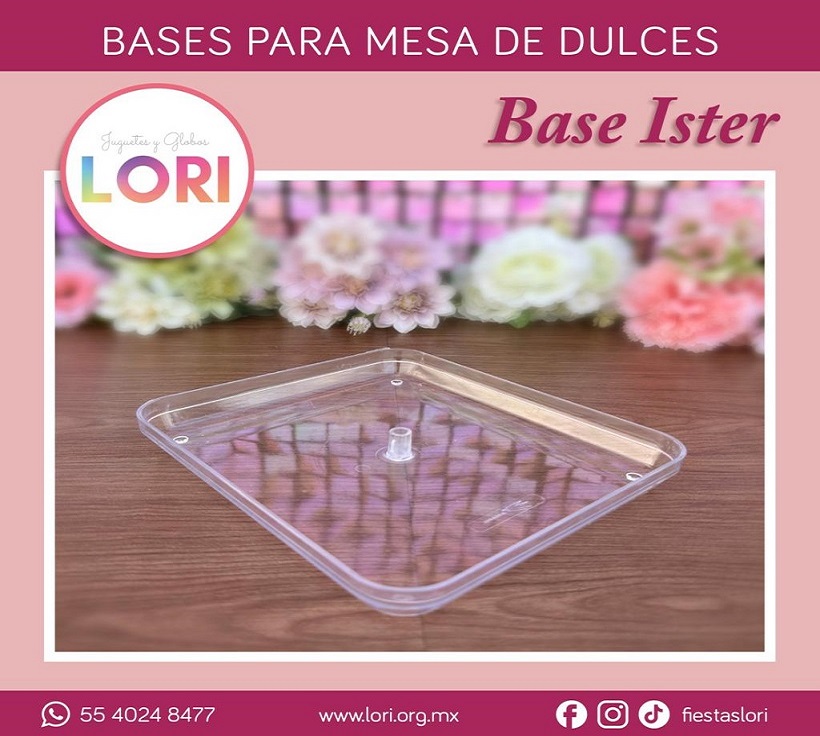 Happy child with glasses holding books and an apple on top