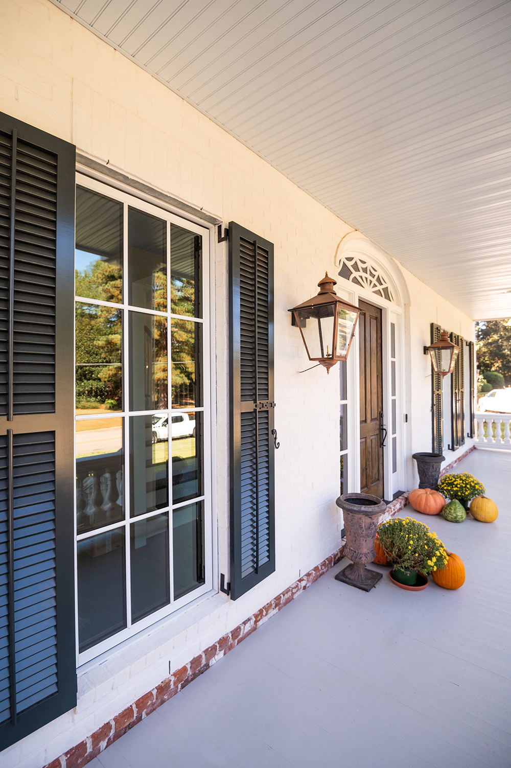 black window shutters outside building