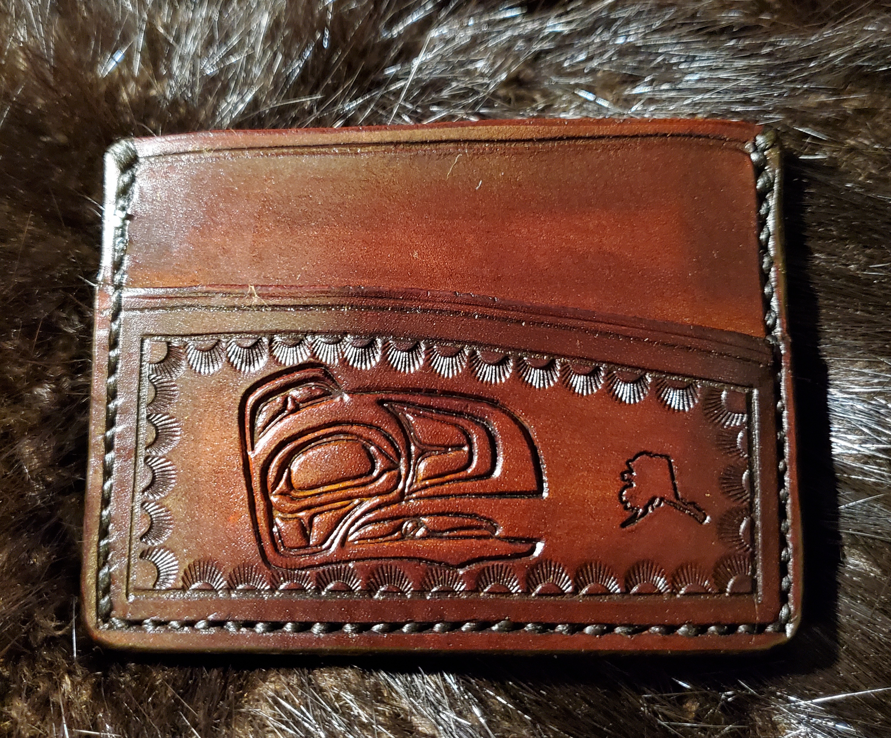 (Front)  Native Raven, 3 pocket Minimalist Wallet,  hand tooled, hand stitched,  $65.00