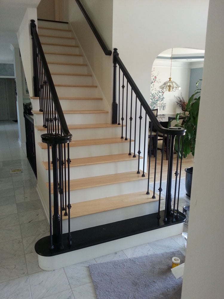 Stairs With Cream Hardwood Flooring