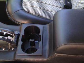 Console has cup holders and storage. Very cool.
