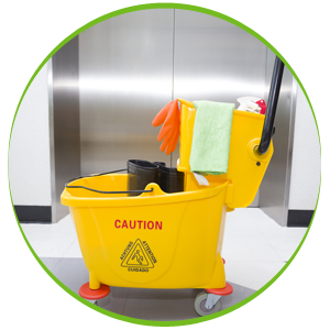 Yellow Mop Bucket And Set Of Cleaning Equipment In The Office