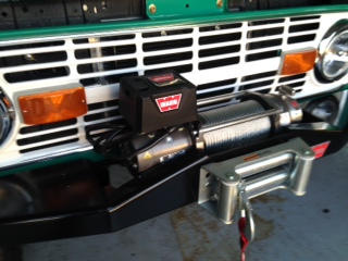 Winch, stainless grill trim, chrome headlight trim.