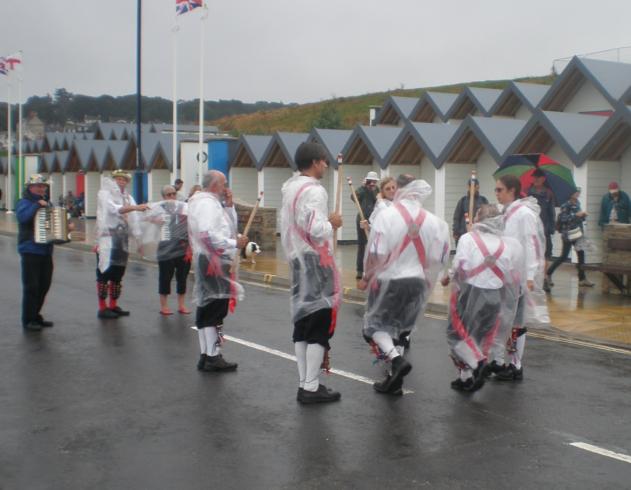 One of the other teams dancing in the rain