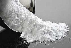 Woman lying on an inflatable ring in a pool